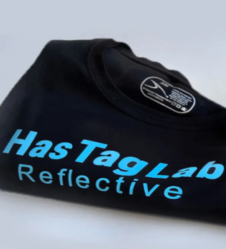 HasTagLab reflective heat transfer on a black T-shirt