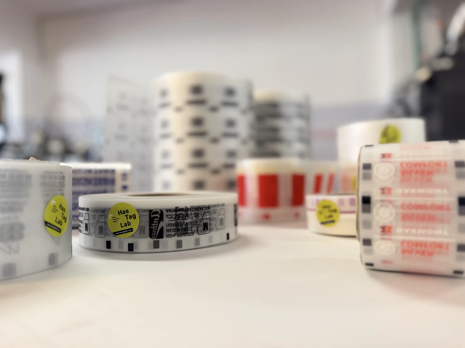 Roll-to-roll heat transfer label rolls in the HasTagLab production area